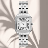 Φωτογραφία του γυναικείου ρολογιού Vogue Victoria 2020615281 με ασημί μπρασελέ και λευκό καντράν, αναδεικνύοντας την κομψότητα και τη minimal αισθητική του