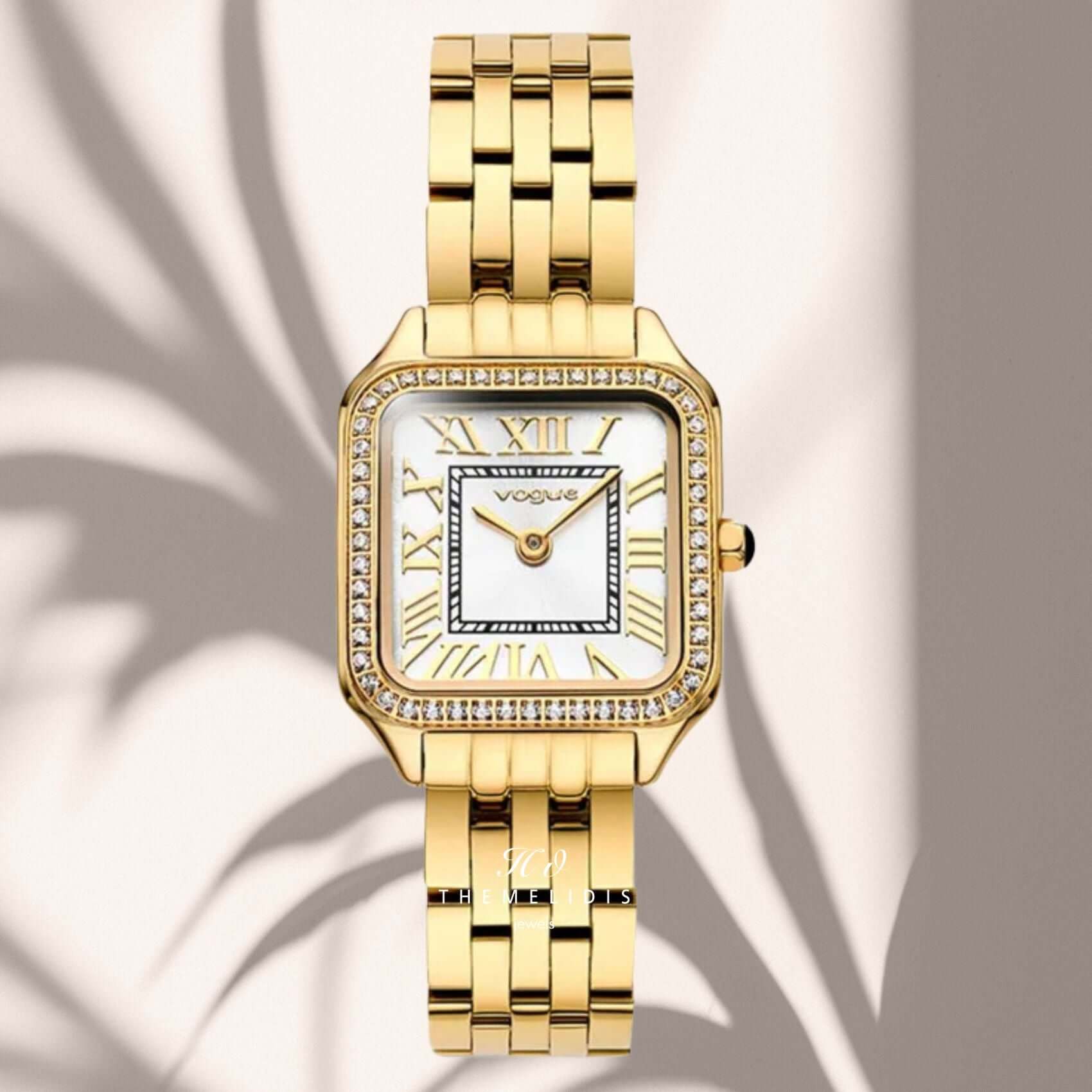 Φωτογραφία του γυναικείου ρολογιού Vogue Victoria Mini 2020615541 με χρυσό μπρασελέ και λευκό καντράν, αναδεικνύοντας την κομψή και λαμπερή αισθητική του