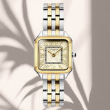 Φωτογραφία του γυναικείου ρολογιού Vogue Victoria Mini 2020615661 με δίχρωμο μπρασελέ και σαμπανί καντράν, αναδεικνύοντας την κομψή και λαμπερή αισθητική του