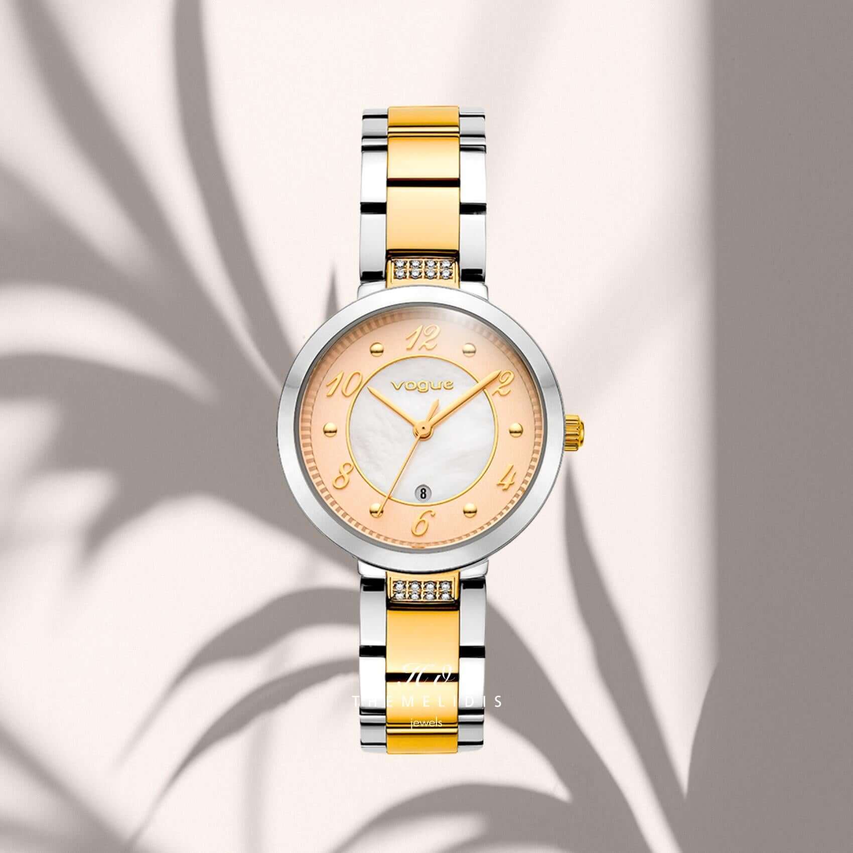 Close-up του καντράν του Vogue Zoe 2020616461 σε λευκό φίλντισι με ροζ τόνο, με ένδειξη ημερομηνίας και ορυκτό κρύσταλλο ειδικής σκλήρυνσης.