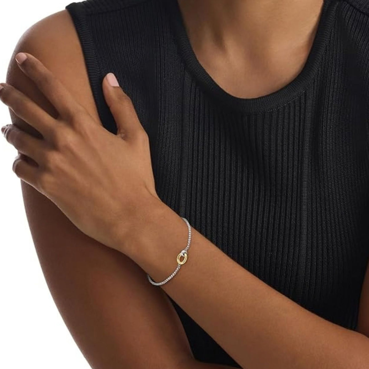 Γυναικείο βραχιόλι Calvin Klein Duality 35000955 ασημί-χρυσό φορεμένο στον καρπό