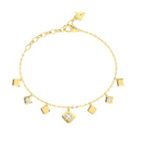 Γυναικείο βραχιόλι Guess Ace of Diamonds JUBB06179JWYGL από ανοξείδωτο ατσάλι σε χρυσό χρώμα με κρεμαστά στοιχεία με πέτρες και λογότυπο Guess.