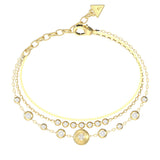 Γυναικείο βραχιόλι Guess Sparks JUBB06279JWYGL από ανοξείδωτο ατσάλι σε χρυσό χρώμα με τριπλή αλυσίδα και ζιργκόν.