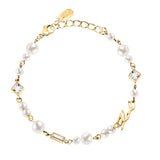 Γυναικείο βραχιόλι Karl Lagerfeld Pearl KLAYR19 από ανοξείδωτο ατσάλι σε χρυσό χρώμα με πέρλες, πέτρες και λογότυπο.