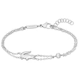 Γυναικείο βραχιόλι Lacoste Crocodile 2040580 από ανοξείδωτο ατσάλι σε ασημί χρώμα με διπλή αλυσίδα και μοτίφ κροκόδειλο.