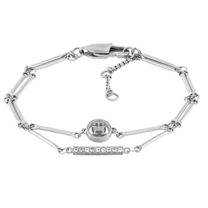 Γυναικείο βραχιόλι Tommy Hilfiger 2780999 από ανοξείδωτο ατσάλι σε ασημί χρώμα με διπλή αλυσίδα, λογότυπο και ορθογώνια μπάρα με ζιργκόν.