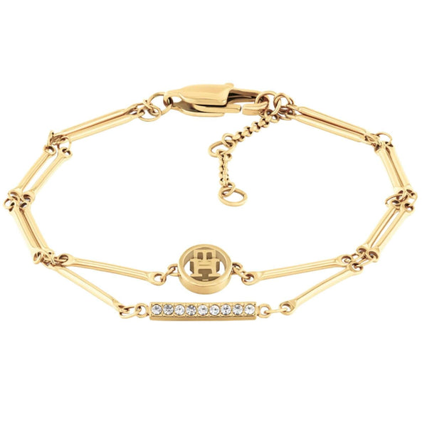 Γυναικείο βραχιόλι Tommy Hilfiger 2781000 από ανοξείδωτο ατσάλι σε χρυσό χρώμα με διπλή αλυσίδα, λογότυπο και ορθογώνια μπάρα με ζιργκόν.