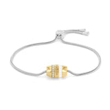 Γυναικείο ατσάλινο ασημί βραχιόλι Tommy Hilfiger 2780621 μήκους 16.5 cm με χρυσό γεωμετρικό στοιχείο και ζιργκόν.