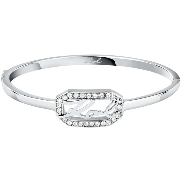 Γυναικείο βραχιόλι χειροπέδα Karl Lagerfeld Crystals KLAYC29 από ανοξείδωτο ατσάλι σε ασημί χρώμα με λευκές πέτρες και λογότυπο.
