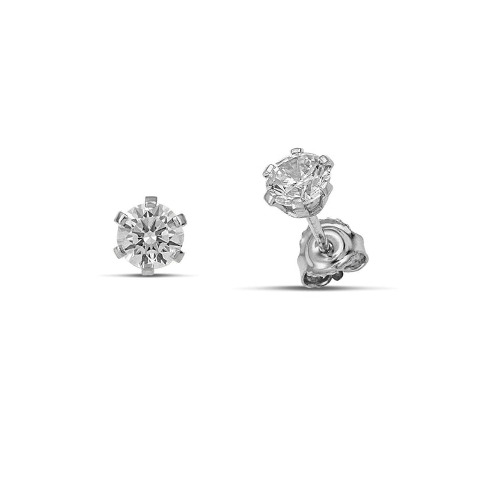 Καρφωτά σκουλαρίκια μονόπετρα από λευκόχρυσο 14 καρατίων με ζιργκόν σε λευκό χρώμα.