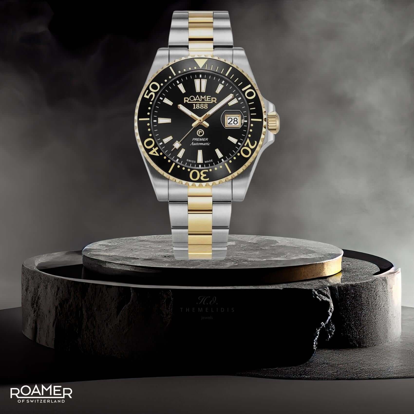 Καταδυτικό ρολόι Roamer Premier 986983-47-85-21 με δίχρωμο ατσάλινο μπρασελέ σε ασημί-χρυσό χρώμα και μαύρο καντράν 42mm με αυτόματο open back μηχανισμό swiss made.