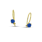 Κρεμαστά σκουλαρίκια από κίτρινο χρυσό 14 καρατίων με πέτρες από μπλε ζιργκόν.