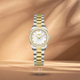 Γυναικείο ρολόι Lee Cooper Ladies LC08155.220 με λευκό φίλντισι καντράν 26mm, χρυσούς δείκτες, ζιργκόν και δίχρωμο μπρασελέ.