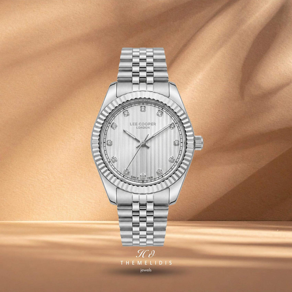 Γυναικείο ρολόι Lee Cooper Ladies LC08400.330 με ασημί καντράν 24mm, ζιργκόν και ασημί μπρασελέ.