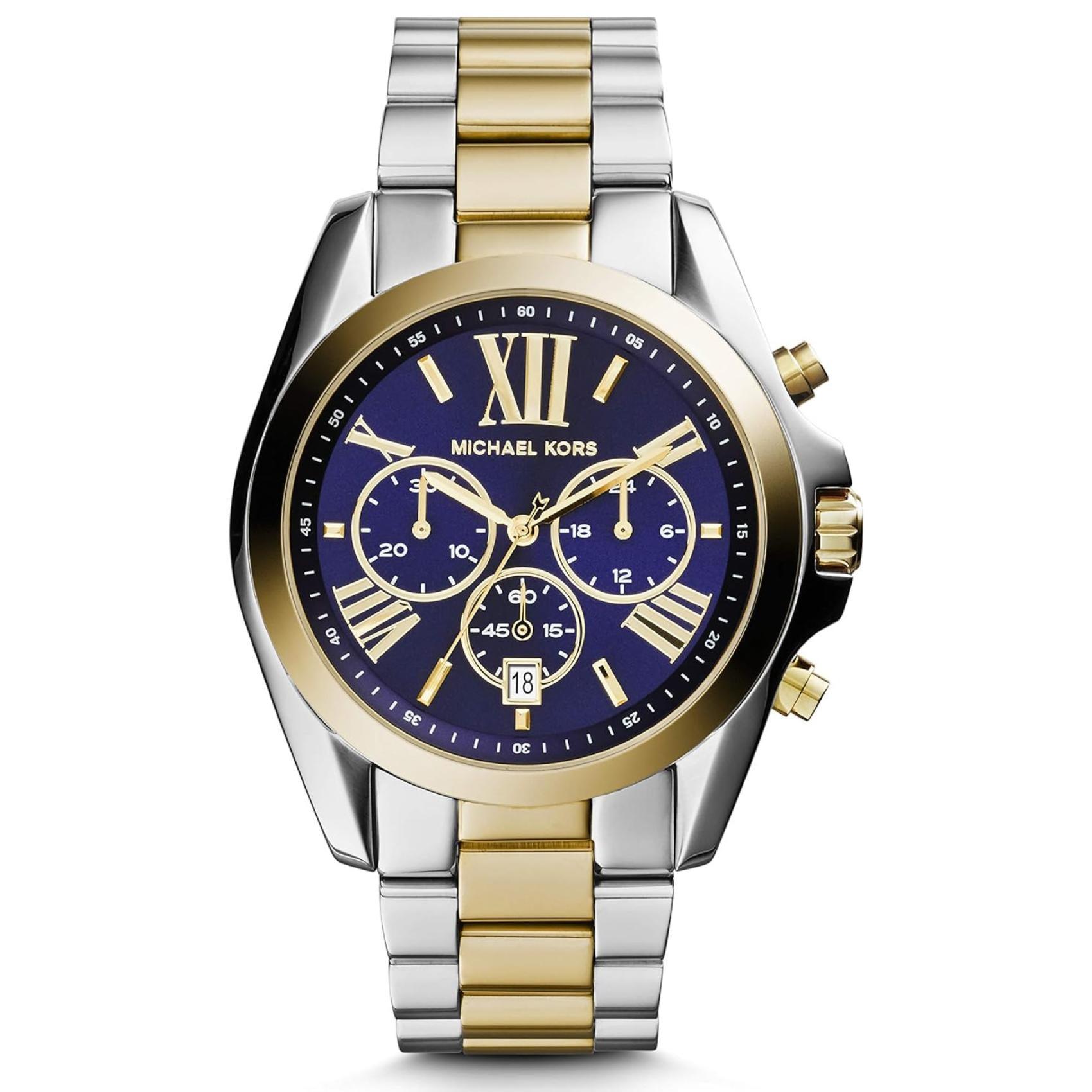 Γυναικείο ρολόι Michael Kors Bradshaw MK5976 χρονογράφος με δίχρωμο ατσάλινο μπρασελέ σε χρυσό-ασημί χρώμα, στρογγυλό μπλε καντράν με ημερομηνία και στεφάνι 42mm.
