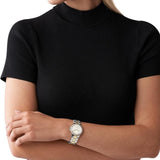 Γυναικείο ρολόι Michael Kors Camille MK6982 με δίχρωμο ασημί-χρυσό ατσάλινο μπρασελέ, στρογγυλό άσπρο καντράν με ημερομηνία-ημέρα και στεφάνι 33mm με ζιργκόν.