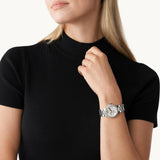Γυναικείο ρολόι Michael Kors Camille MK7198 με ασημί ατσάλινο μπρασελέ, στρογγυλό άσπρο καντράν με ημερομηνία-ημέρα και στεφάνι 33mm με ζιργκόν.