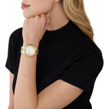 Γυναικείο ρολόι Michael Kors Camille MK7270 χρονογράφος με χρυσό ατσάλινο μπρασελέ, στρογγυλό άσπρο καντράν με λατινικούς αριθμούς και στεφάνι 43mm.