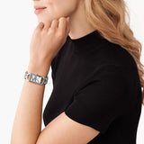 Τετράγωνο γυναικείο ρολόι Michael Kors Empire MK7407 με ασημί ατσάλινο μπρασελέ και ασημί καντράν 30mm.