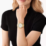Γυναικείο ρολόι Michael Kors Everest MK7401 με χρυσό ατσάλινο μπρασελέ και άσπρο φίλντισι καντράν διαμέτρου 40mm με ζιργκόν.