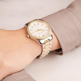 Γυναικείο ρολόι Michael Kors Layton MK6849 με δίχρωμο ασημί-ροζ χρυσό μπρασελέ, στρογγυλό άσπρο φίλντισι καντράν και στεφάνι 38mm με ζιργκόν.