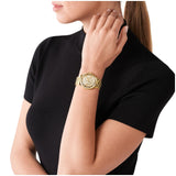 Γυναικείο ρολόι Michael Kors Lennox MK7229 με χρυσό ατσάλινο μπρασελέ, χρυσό καντράν και στρογγυλό στεφάνι 37mm με ζιργκόν.