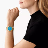 Γυναικείο ρολόι Michael Kors Lennox MK7460 με χρυσό ατσάλινο μπρασελέ και τιρκουάζ καντράν 37mm.