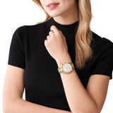 Γυναικείο ρολόι Michael Kors Lexington MK7241 χρονογράφος με χρυσό ατσάλινο μπρασελέ, στρογγυλό άσπρο φίλντισι καντράν με ημερομηνία και στεφάνι 38mm.
