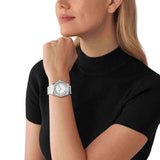 Γυναικείο ρολόι Michael Kors Lexington MK7445 με ασημί ατσάλινο μπρασελέ, στρογγυλό ασημί καντράν με ζιργκόν και στεφάνι 38mm.