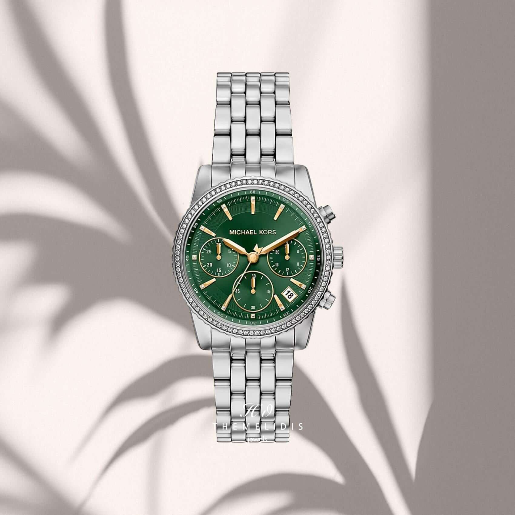 Γυναικείο ρολόι Michael Kors Bryant MK7583 με πράσινο καντράν 35mm, χρονογράφο, ζιργκόν και ασημί μπρασελέ.