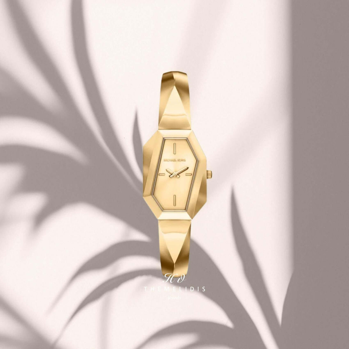 Γυναικείο ρολόι Michael Kors Suri MK7589 με χρυσό καντράν, τετράγωνο πλαίσιο 24mm και χρυσό ατσάλινο μπρασελέ.