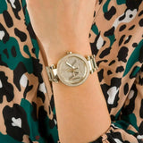 Γυναικείο ρολόι Michael Kors Parker MK7283 με ατσάλινο μπρασελέ σε χρυσό χρώμα, στρογγυλό χρυσό καντράν και στεφάνι 39mm με ζιργκόν.
