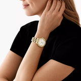 Γυναικείο ρολόι Michael Kors Sage MK4805 με χρυσό ατσάλινο μπρασελέ και άσπρο φίλντισι καντράν 38mm με ζιργκόν.