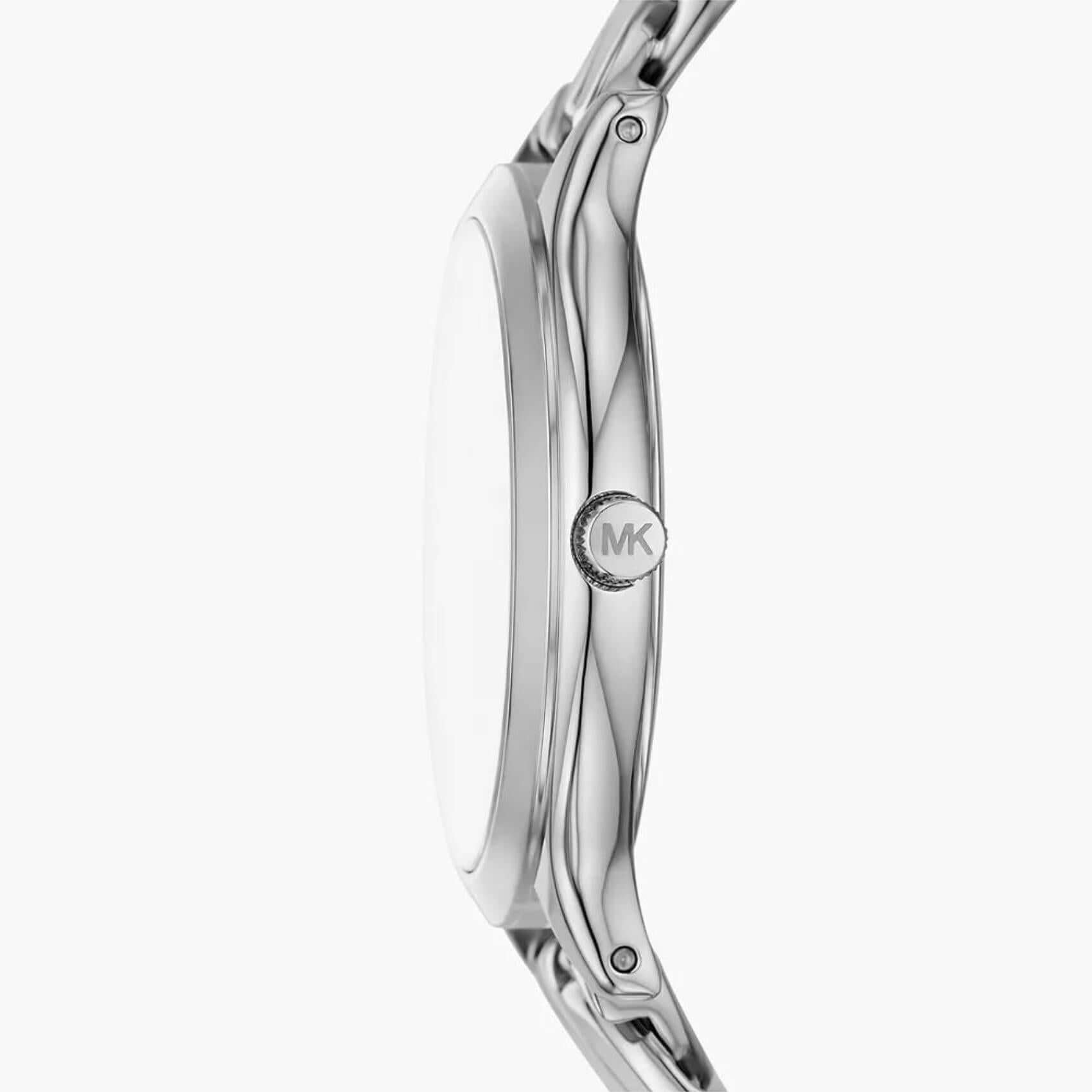 Γυναικείο ρολόι Michael Kors Slim Runway MK7474 με ασημί ατσάλινο μπρασελέ σε πλέξιμο αλυσίδας και ασημί καντράν 38mm.