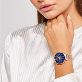 Γυναικείο ρολόι Michael Kors Sofie MK3971 με ατσάλινο μπρασελέ σε ροζ χρυσό χρώμα, στρογγυλό μπλε καντράν και στεφάνι 36mm με ζιργκόν.