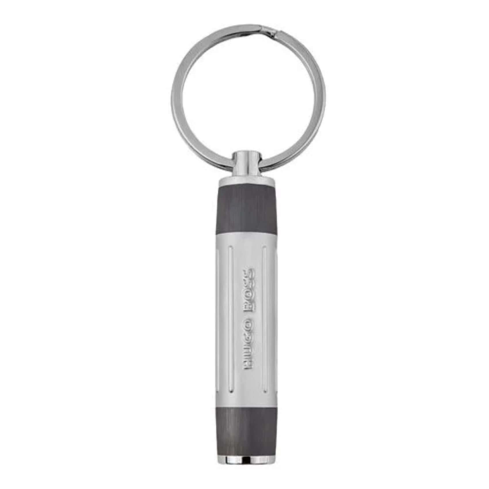 Ασημί και μαύρο μπρελόκ HUGO BOSS HAK306D από ατσάλινο υλικό με κυλινδρικό design της σειράς Gear Ribs