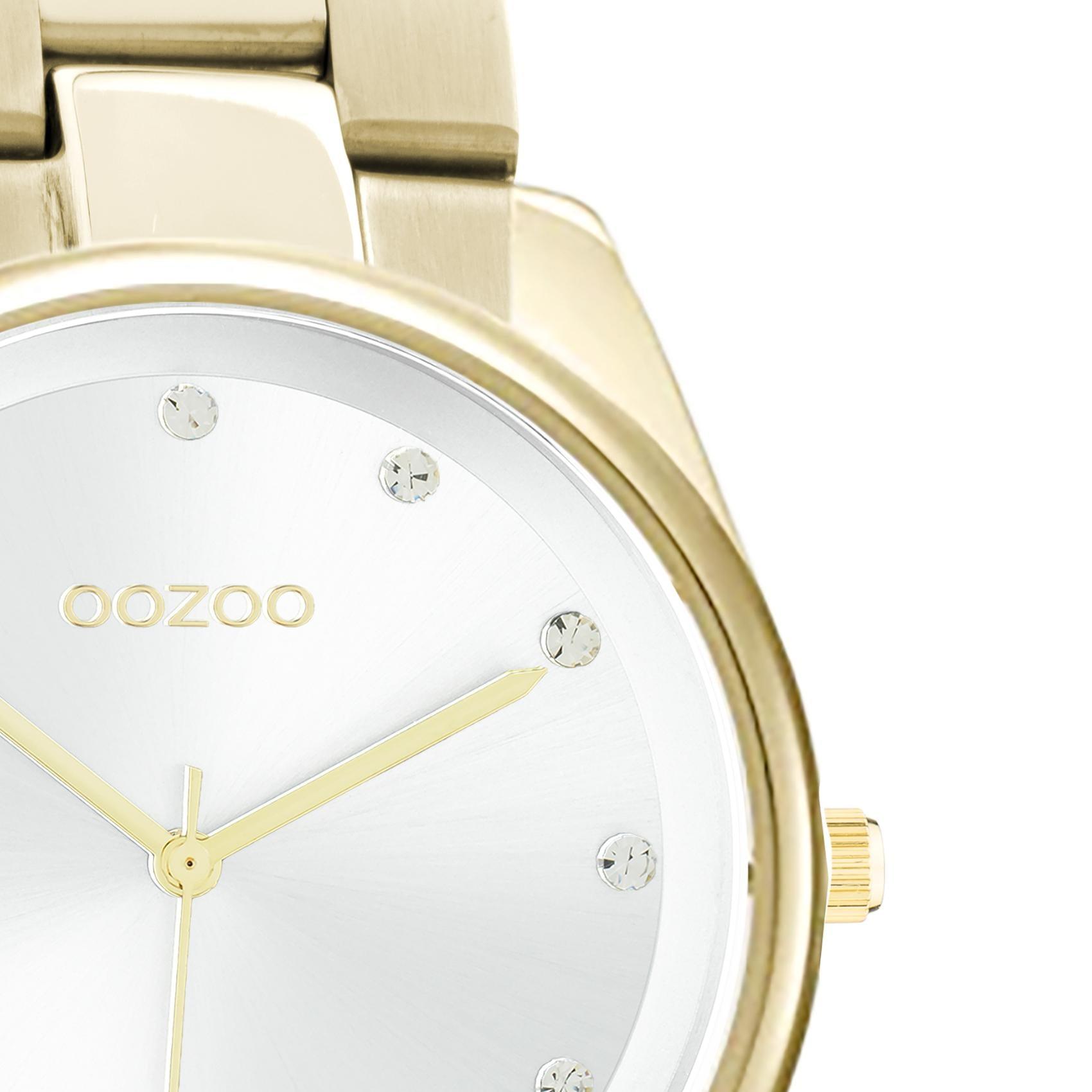 Ρολόι Oozoo C10962 με χρυσό ατσάλινο μπρασελέ, άσπρο καντράν διαμέτρου 36mm με ζιργκόν και μηχανισμό μπαταρίας quartz.
