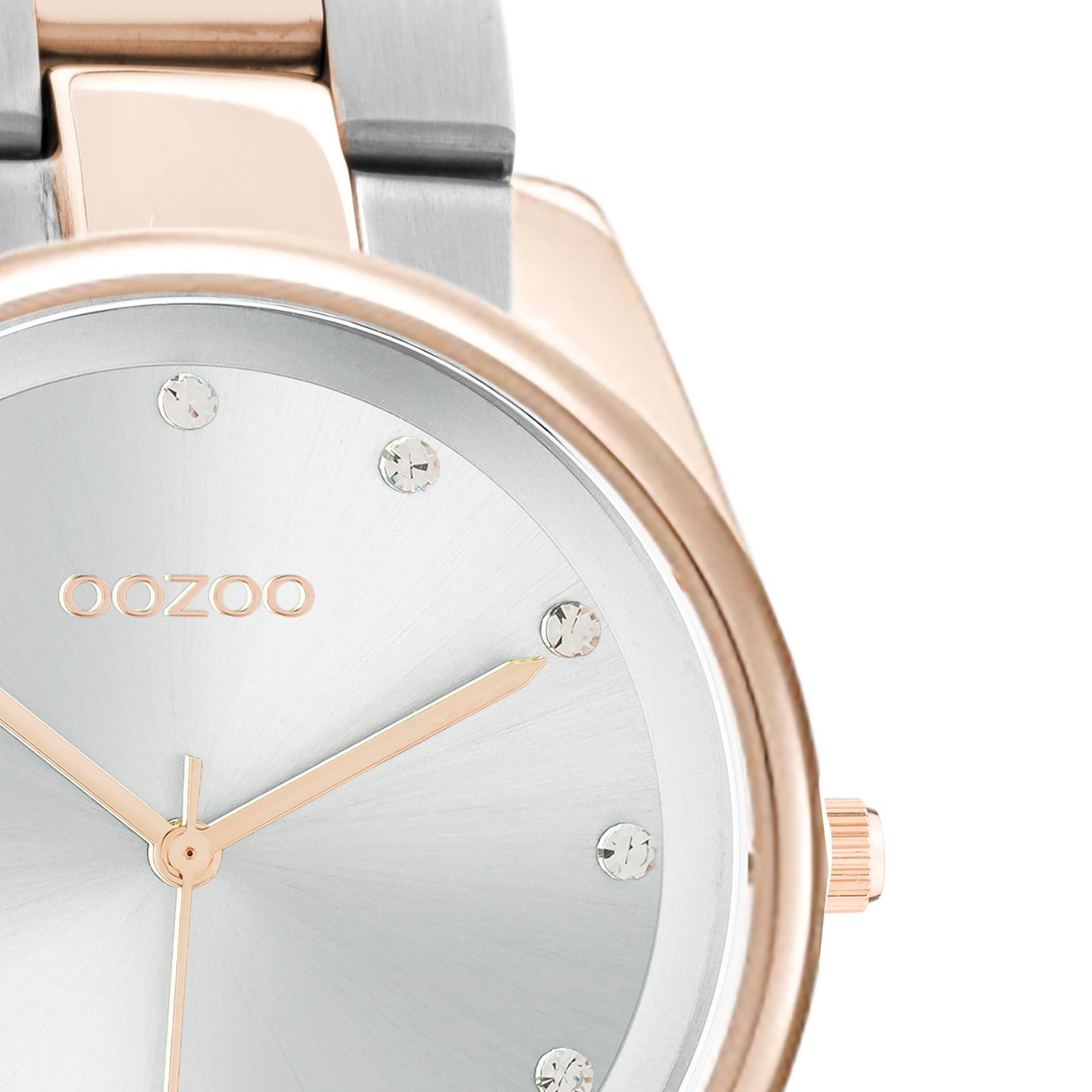 Ρολόι Oozoo C10964 με ασημί-ροζ χρυσό ατσάλινο μπρασελέ, ασημί καντράν διαμέτρου 36mm με ζιργκόν και μηχανισμό μπαταρίας quartz.
