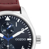 Ρολόι Oozoo C11006 με καφέ δερμάτινο λουράκι ,μπλε σκούρο καντράν διαμέτρου 42mm και μηχανισμό μπαταρίας quartz.