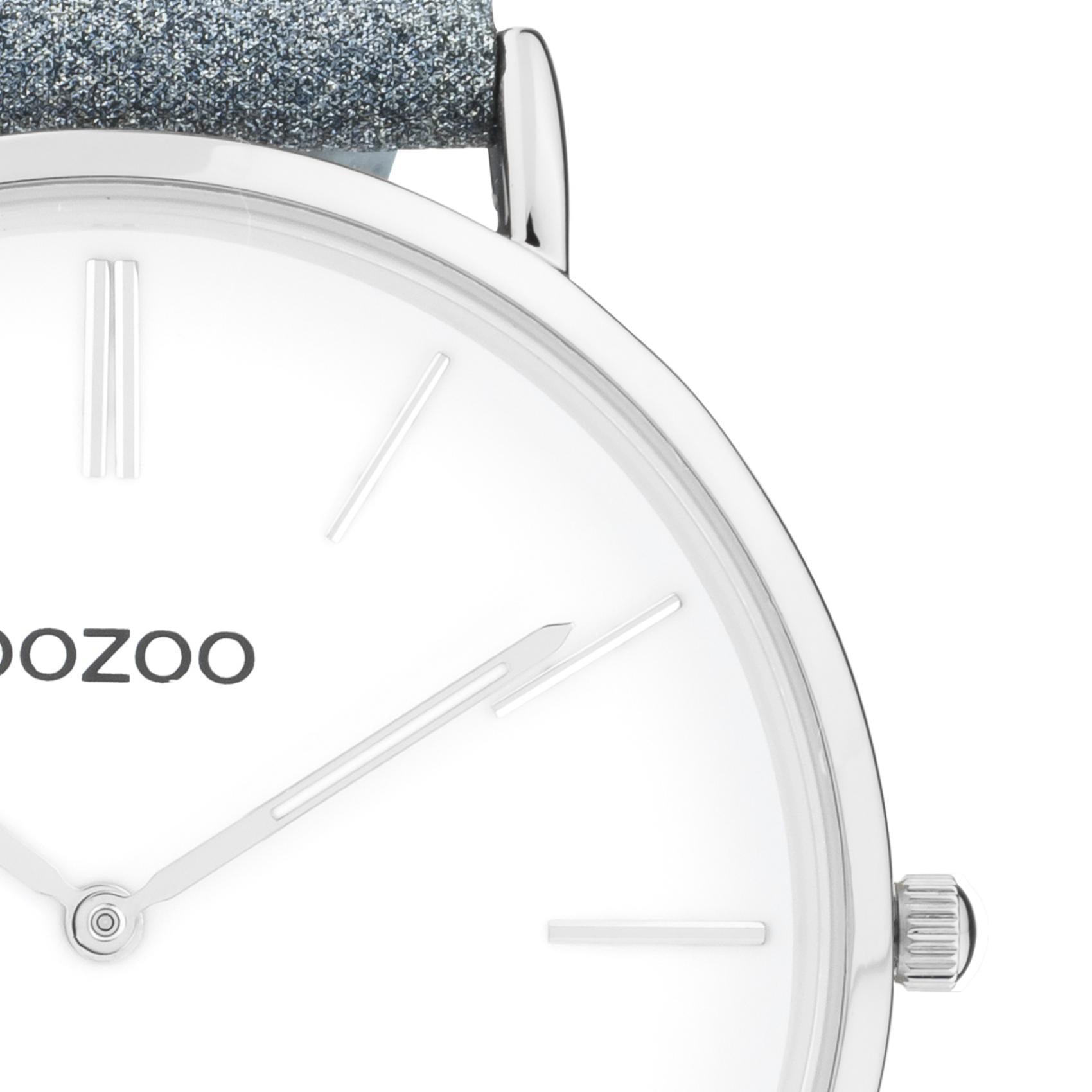 Στρογγυλό ρολόι Oozoo Vintage C20147 με μπλε δερμάτινο λουράκι,άσπρο καντράν διαμέτρου 43mm και μηχανισμό μπαταρίας quartz.