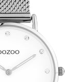 Στρογγυλό ρολόι Oozoo Vintage C20240 με ασημί ατσάλινο μπρασελέ,άσπρο καντράν με ζιργκόν διαμέτρου 32mm και μηχανισμό μπαταρίας quartz.