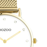 Στρογγυλό ρολόι Oozoo Vintage C20241 με χρυσό ατσάλινο μπρασελέ,άσπρο καντράν με ζιργκόν διαμέτρου 32mm και μηχανισμό μπαταρίας quartz.