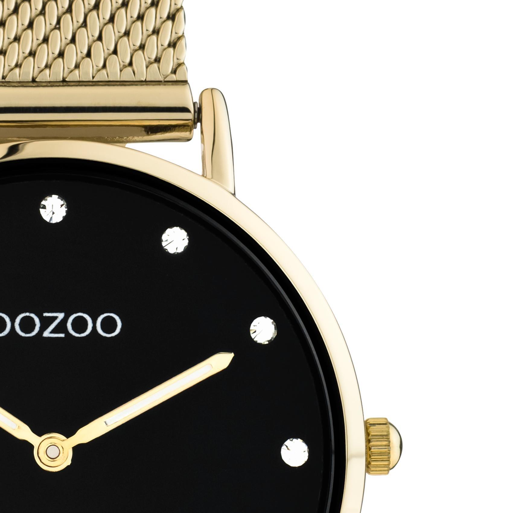 Στρογγυλό ρολόι Oozoo Vintage C20242 με χρυσό ατσάλινο μπρασελέ,μαύρο καντράν με ζιργκόν διαμέτρου 32mm και μηχανισμό μπαταρίας quartz.