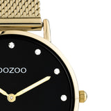 Στρογγυλό ρολόι Oozoo Vintage C20242 με χρυσό ατσάλινο μπρασελέ,μαύρο καντράν με ζιργκόν διαμέτρου 32mm και μηχανισμό μπαταρίας quartz.