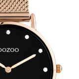 Στρογγυλό ρολόι Oozoo Vintage C20244 με ροζ χρυσό ατσάλινο μπρασελέ,μαύρο καντράν με ζιργκόν διαμέτρου 32mm και μηχανισμό μπαταρίας quartz.