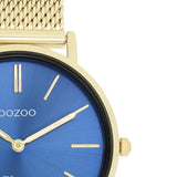 Ρολόι Oozoo Vintage C20292 με χρυσό ατσάλινο μπρασελέ,μπλε καντράν διαμέτρου 32mm και μηχανισμό μπαταρίας quartz.