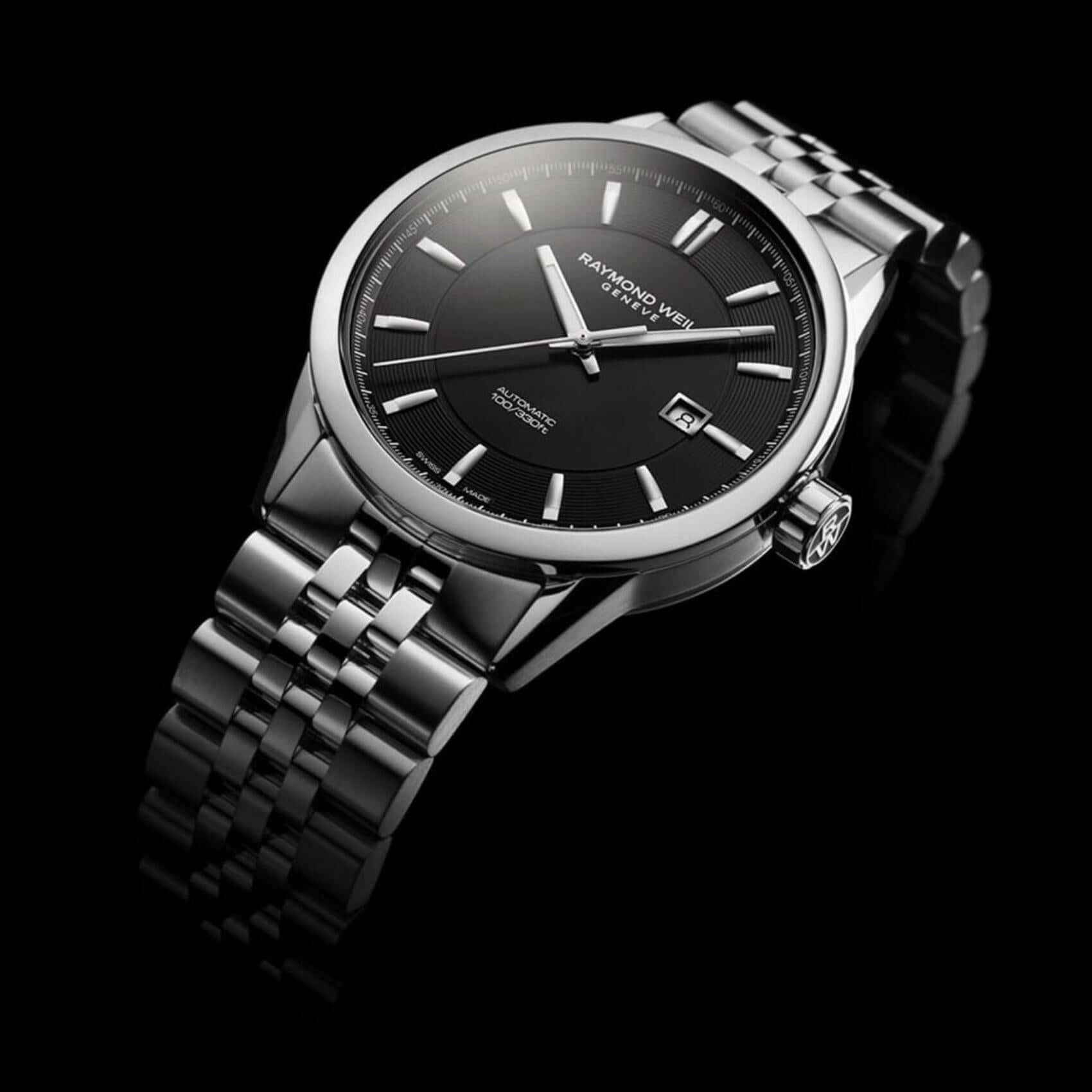 Ρολόι Raymond Weil Freelancer 2731-ST-20001 με ασημί ατσάλινο μπρασελέ και μαύρο καντράν διαμέτρου 42mm.