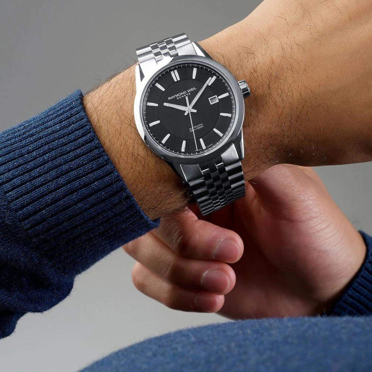 Ρολόι Raymond Weil Freelancer 2731-ST-20001 με ασημί ατσάλινο μπρασελέ και μαύρο καντράν διαμέτρου 42mm.