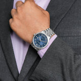 Ρολόι Raymond Weil Freelancer 2731-ST-50001 αυτόματο με ασημί ατσάλινο μπρασελέ και μπλε καντράν διαμέτρου 42mm.