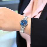 Ρολόι Raymond Weil Toccata Diamonds 5385-ST-50081 με ασημί μπρασελέ και μπλε καντράν 30mm με διαμάντια.